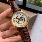 Perfect Replica Patek Philippe White Hollow Dial Gold Case 42mm Watch 